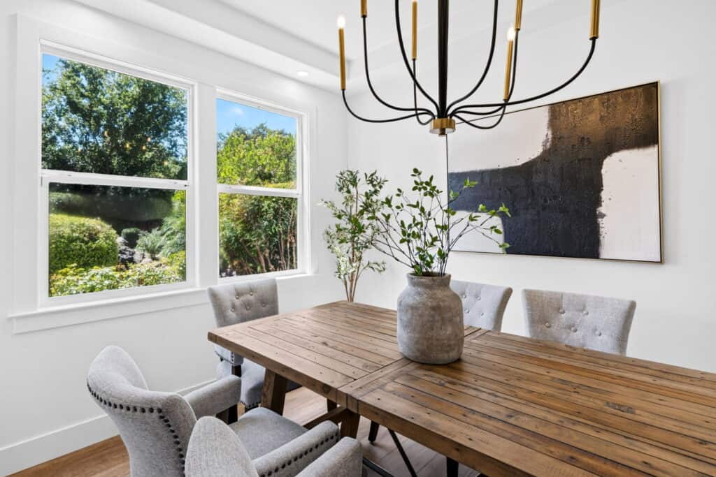 Contemporary California dining room with chairs and modern art
